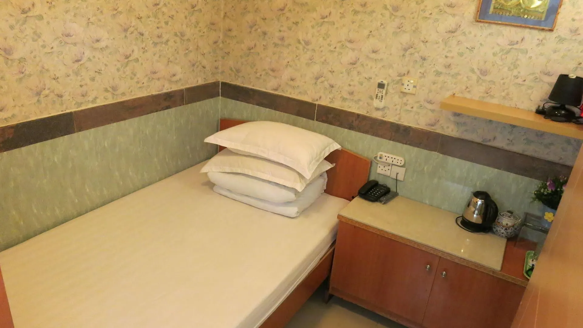 Geo Home Holiday Hotel Kowloon  0*, Kowloon (Hong Kong)